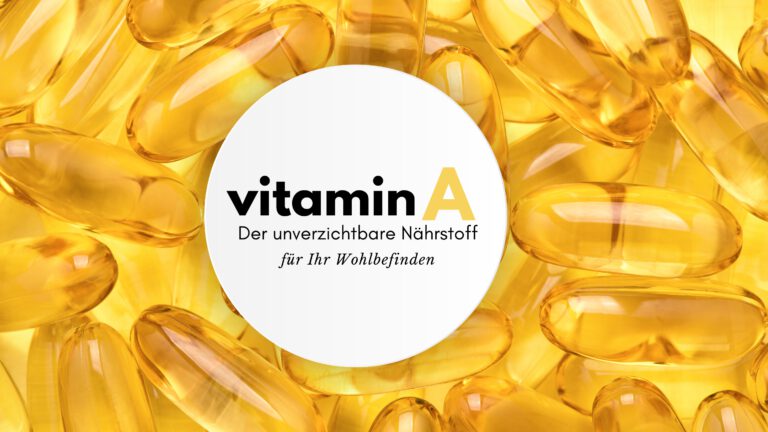Vitamin A Kapseln auf gelbem Hintergrund mit Text 'vitamin A - Der unverzichtbare Nährstoff für Ihr Wohlbefinden'.