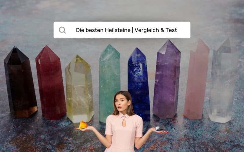 Frau vergleicht Citrin und Hämatit vor Reihe bunter Kristall­säulen – Heilsteine Vergleich & Test 2025